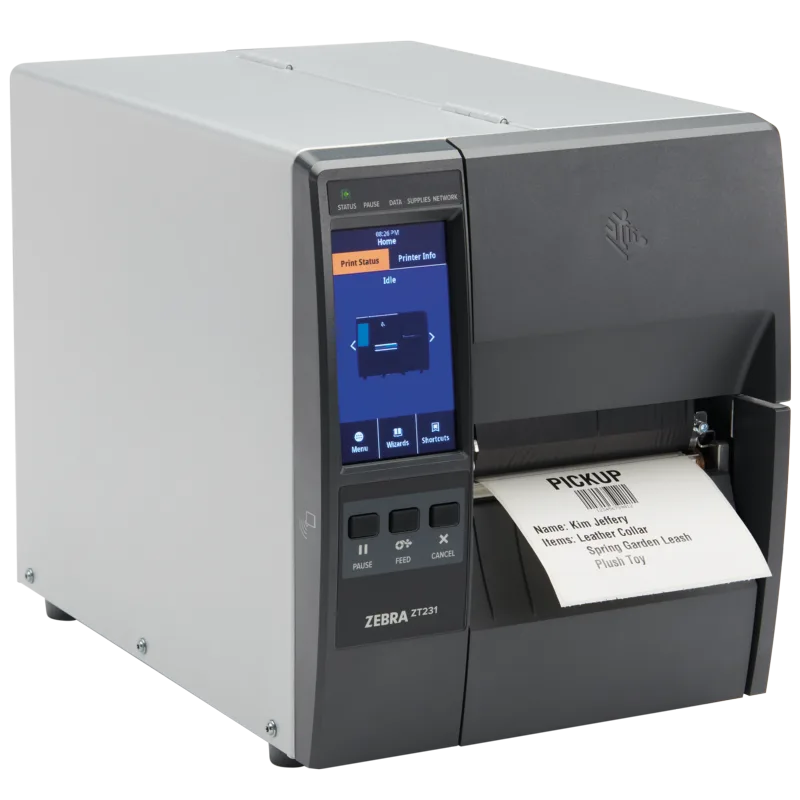 Zebra ZT231 industrial label printer from the right, label at the output